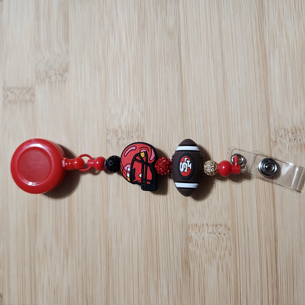Red and Black Football Badge Reel